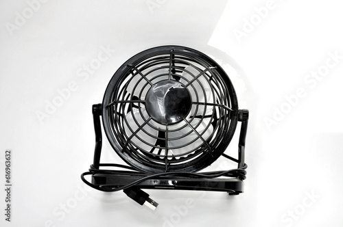 Desktop small fan in black. Front view.