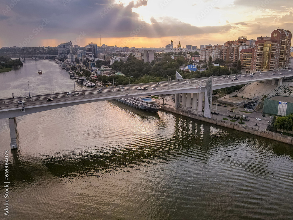 The aerial view of the bridge across the river Don during the sunset at the city of Rostov-on-Don (Rostov-na-Donu), Russia, close to the border with Ukraine. 