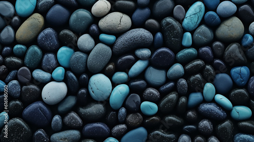 An indian stone background with black and teal rocks,