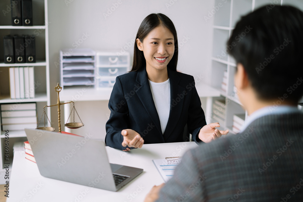 Legal counsel presents to the client a signed contract with legal law. justice and lawyer concept in office. Legal counsel presents to the client a signed contract with legal law. justice and lawyer concept in office.