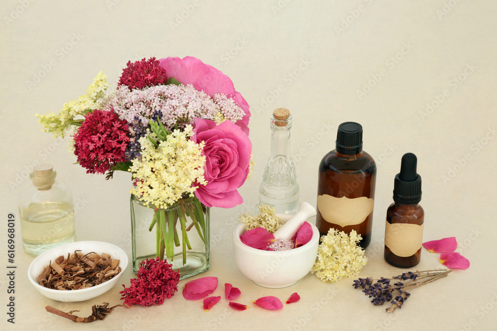 Tranquilizing flowers herbs with valerian root, rose, elder and lavender used in natural herbal medicine. Adaptogen foods with tincture, oil, water bottles and mortar on hemp paper. Tranquilizing flowers herbs with valerian root, rose, elder and lavender used in natural herbal medicine. Adaptogen foods with tincture, oil, water bottles and mortar on hemp paper.