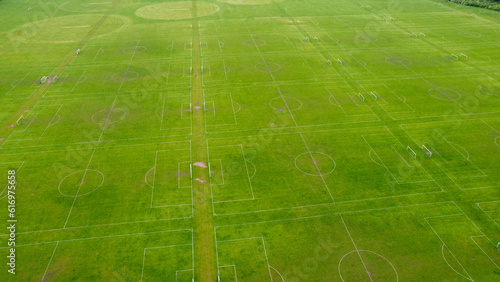 A lot of  empty football pitches or soccer pitches seen from the sky with a drone view in Hackney Marshes
