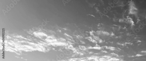 Grey sky with white clouds in rainy season, beautiful grey and white sky background textures, black and white sky, cloudy sky with stormy clouds. Low cumulus clouds of various shapes cover almost the
