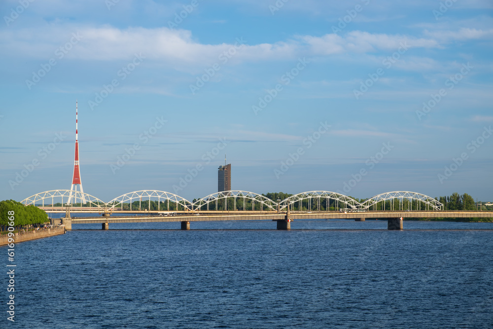 Obraz na płótnie View of the railway bridge over Daugava river and Riga Radio and Television Tower. Riga, Latvia. w salonie