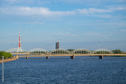 View of the railway bridge over Daugava river and Riga Radio and Television Tower. Riga, Latvia.
