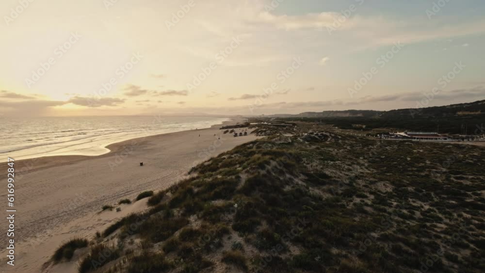 Exotic coast of Costa De Caparica in Portugal, aerial sunset view Exotic coast of Costa De Caparica in Portugal, aerial sunset view