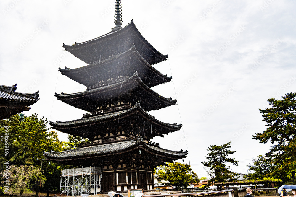 Kofukuji Temple in the rain on a sunny day in Nara, Japan