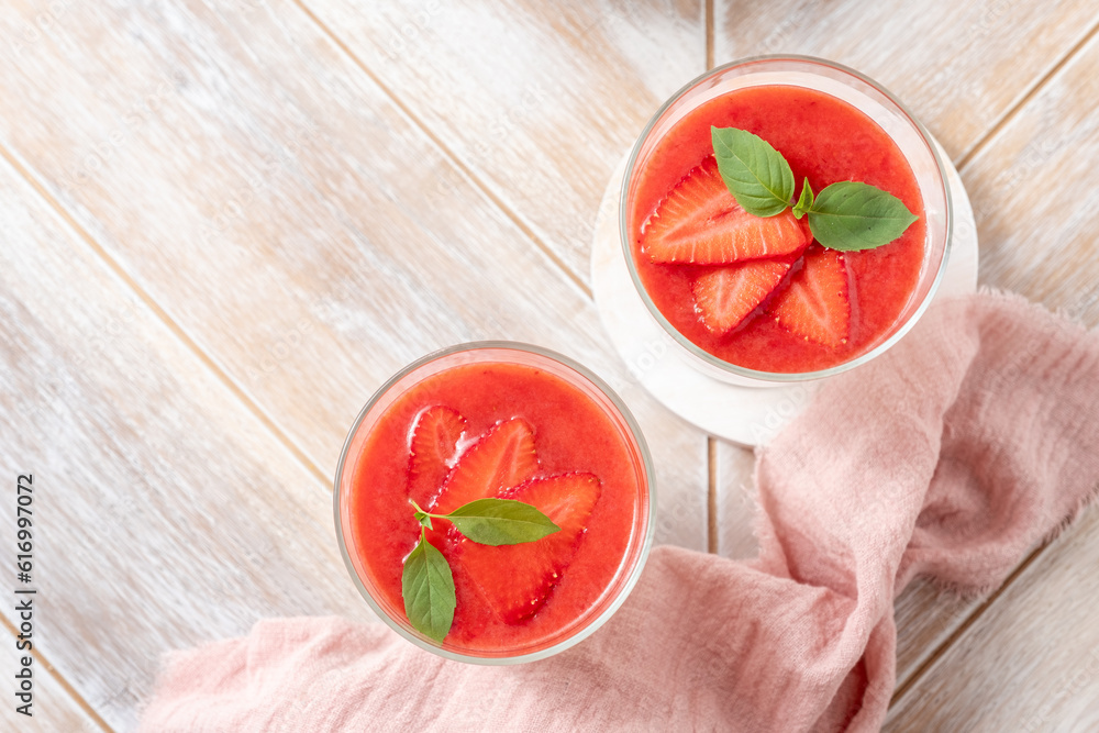 Italian dessert panna cotta in glass with strawberries. Italian dessert panna cotta in glass with strawberries.