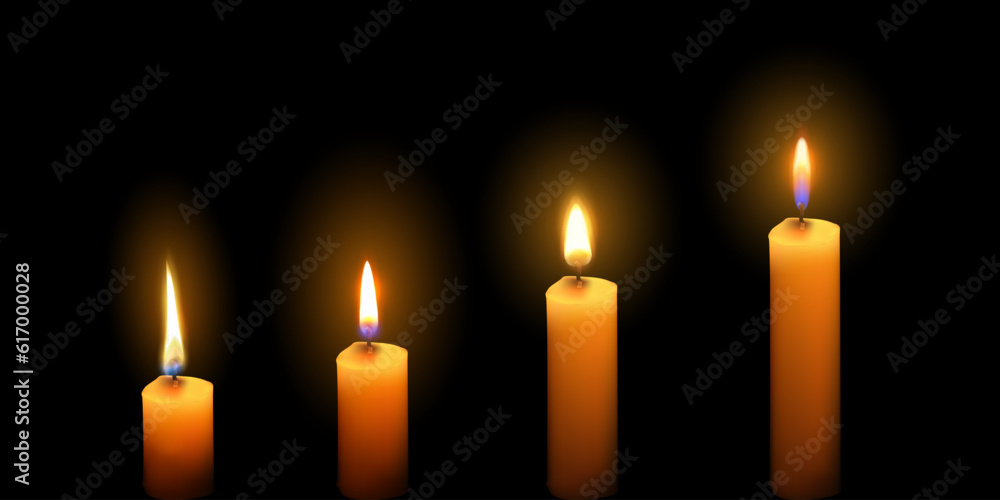 Realistic candle collection on a black background. Set of realistic candle