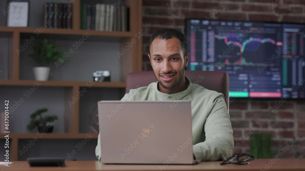 Happy trader surprised by the good news on laptop and making yes gesture. Businessman enjoying success, celebrating victory, make good deal, get profit. The rise stock market and cryptocurrencies. Happy trader surprised by the good news on laptop and making yes gesture. Businessman enjoying success, celebrating victory, make good deal, get profit. The rise stock market and cryptocurrencies.