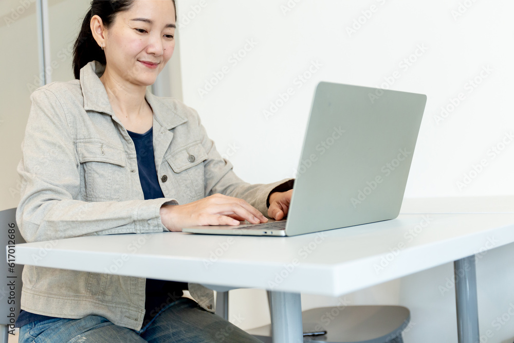 woman work using computer hand typing laptop keyboard contact us.student study learning education online.adult professional people chatting search at office.concept for technology device business woman work using computer hand typing laptop keyboard contact us.student study learning education online.adult professional people chatting search at office.concept for technology device business