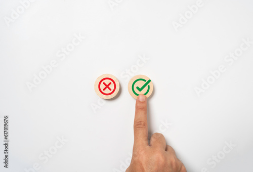 Hand touching and select to green correct sign symbol for approve document and project concept.