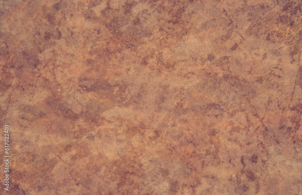 An old textured brown floor with a pattern and copy space. Background texture light rough textured spotted blank. An old textured brown floor with a pattern and copy space. Background texture light rough textured spotted blank.