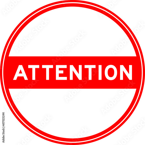 Red color round seal sticker in word attention on white background