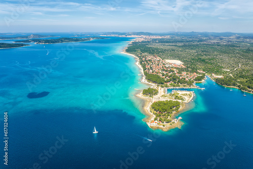 Fototapeta Naklejka Na Ścianę i Meble -  Aerial view of the fortress of St. Nicholas and the many islands in the waters of the picturesque town of Shibenik on the Adriatic coast of Croatia.