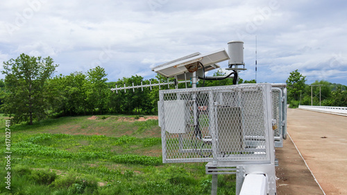 Naklejka Close up view of water level a measurement and flood warning system installed on the local bridge closed to a community 