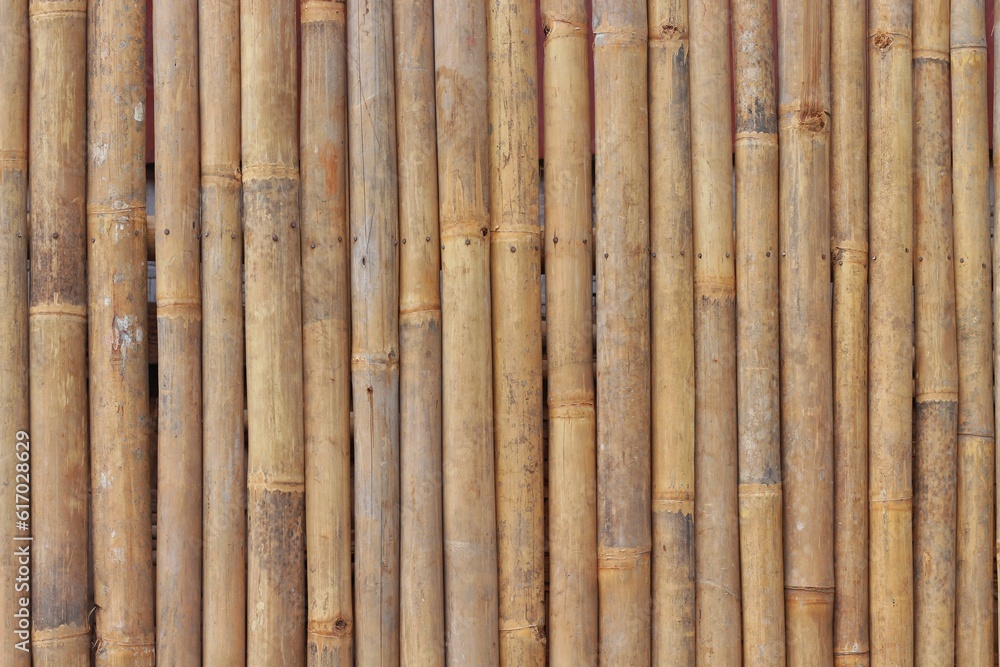 old brown tone bamboo plank fence texture for background old brown tone bamboo plank fence texture for background