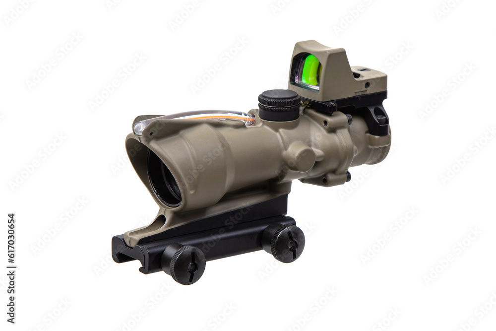 Modern military collimator sight. Aiming device for shooting at close and medium distances. Isolate on a white back Modern military collimator sight. Aiming device for shooting at close and medium distances. Isolate on a white back