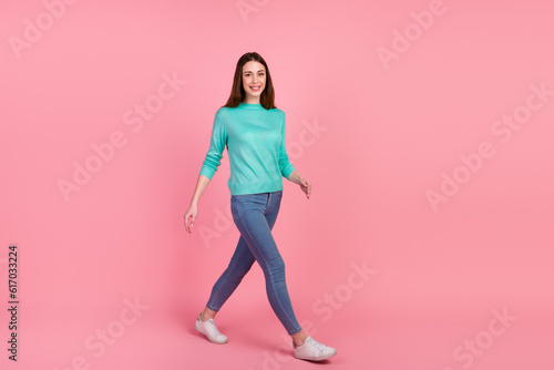 Full size photo of positive optimistic lady look sweet cute walk weekend isolated pastel color background