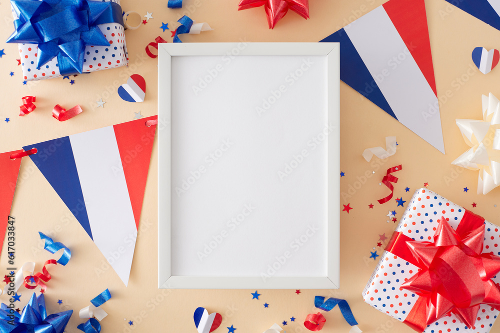 Obraz premium Idea for patriotic celebrations on Bastille Day. Top view composition of french flag garlands, presents with bows, stars, hearts, confetti on pastel beige background with frame for advert or text