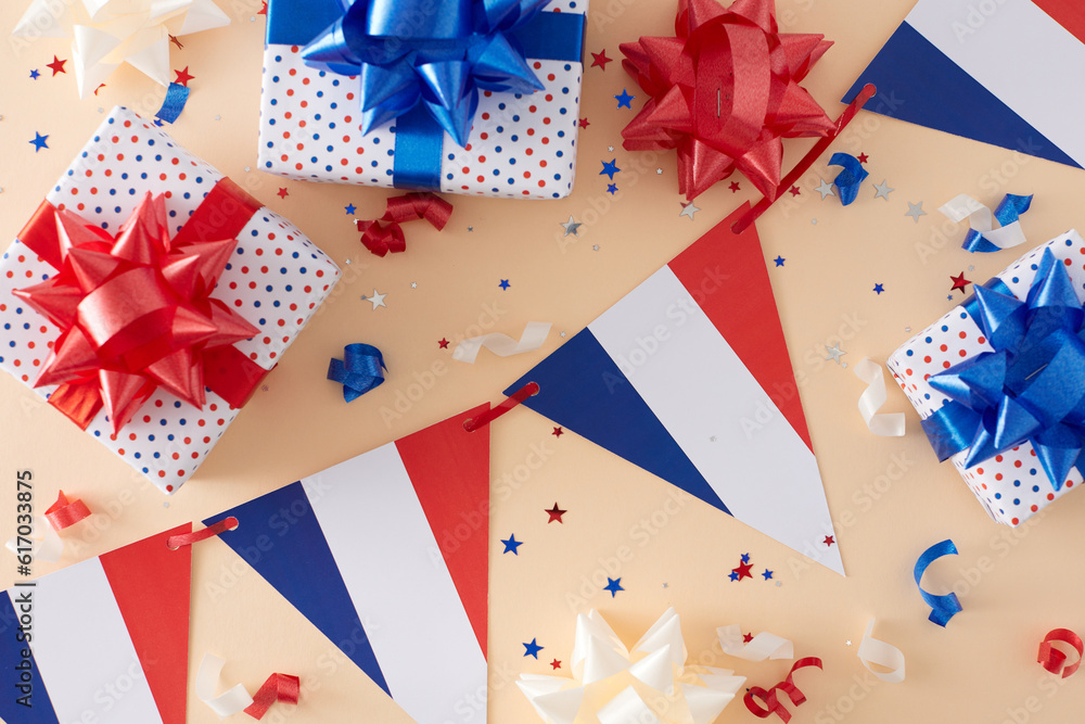 Obraz premium Concept for patriotic commemorations on Bastille Day. Top view photo of french national garlands, gift boxes, colorful bows, confetti on pastel beige background