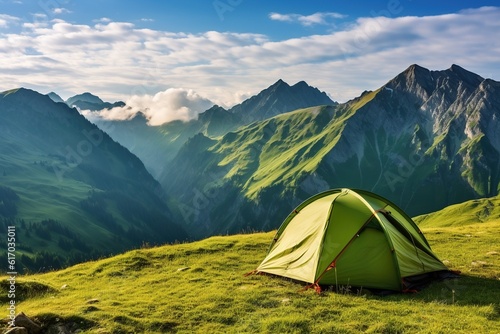 Photo of a camping tent on epic mountains landscape in summerGenerative AI © dhiyaeddine
