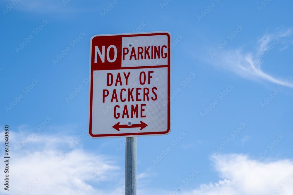 No Parking - Day of Packers Game, sign near Lambeau Field, home of the Green Bay Packers NFL team No Parking - Day of Packers Game, sign near Lambeau Field, home of the Green Bay Packers NFL team