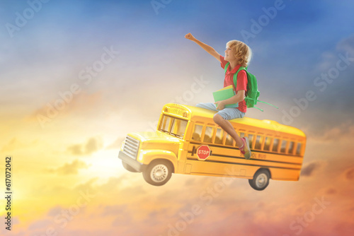 Child going back to school. Boy on school bus.