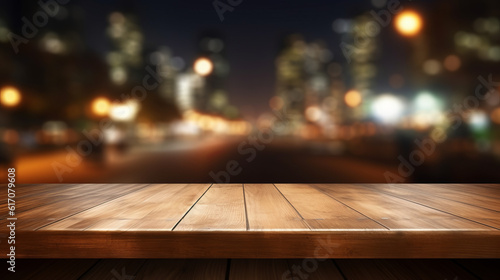A wooden table with a blurred cityscape in the background