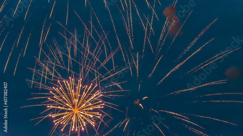 Blurred light pattern of the fireworks as background.