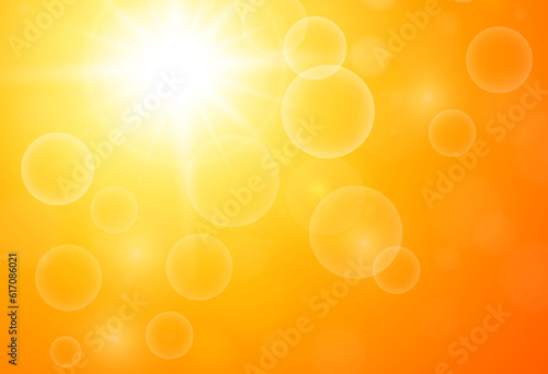 Orange hot sunny background, sun with bokeh, blazing hot sun on a hot summer day.
