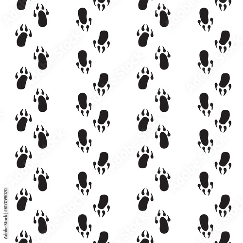 Abstract seamless pattern with black animal paw.  © Alexandra