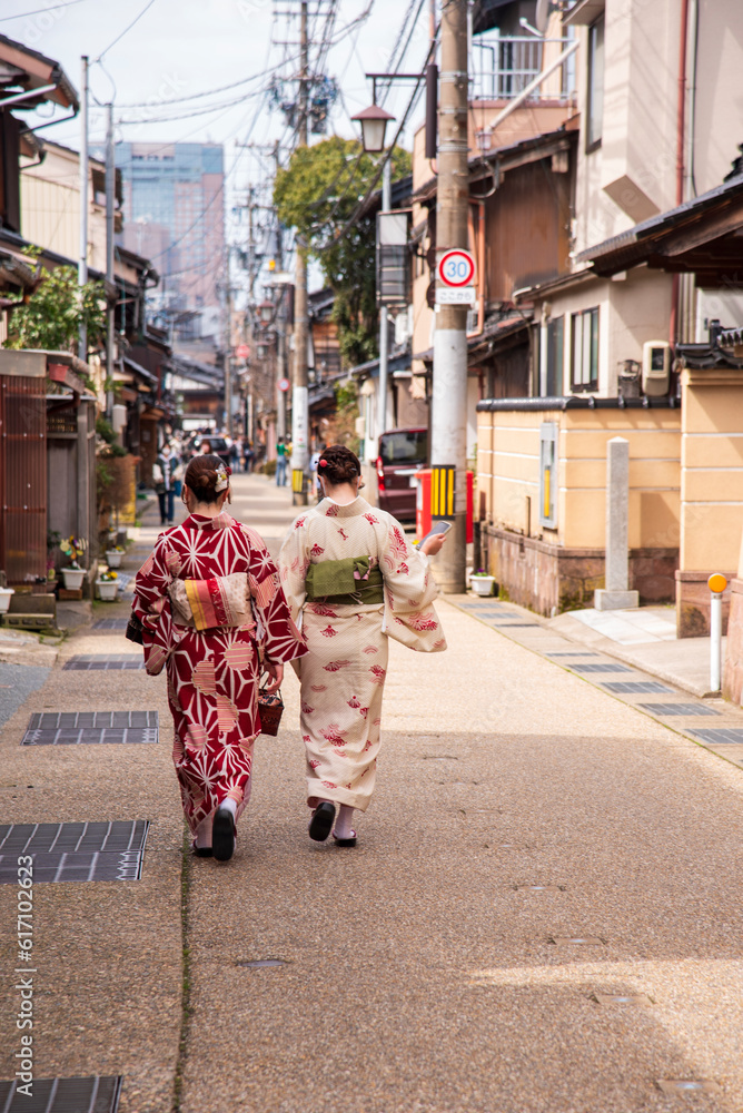 Two people dresses in Kimono's in the Higashi Chaya Geisha District in Kanazawa, Japan