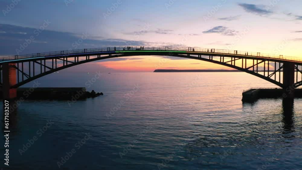 Aerial travelling at Xiying Rainbow Bridge, sunset, Magong, Penghu Island, Taiwan Aerial travelling at Xiying Rainbow Bridge, sunset, Magong, Penghu Island, Taiwan