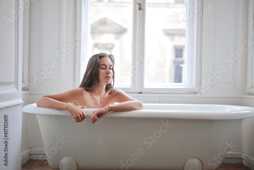 portrait of young woman in bathtub