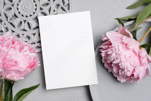Invitation or greeting card mockup with flowers, blank card mock up with copy space