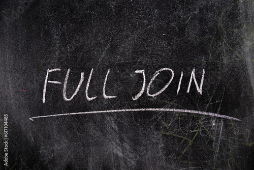 Full join inscription on a black chalk board, training courses for working with databases SQL