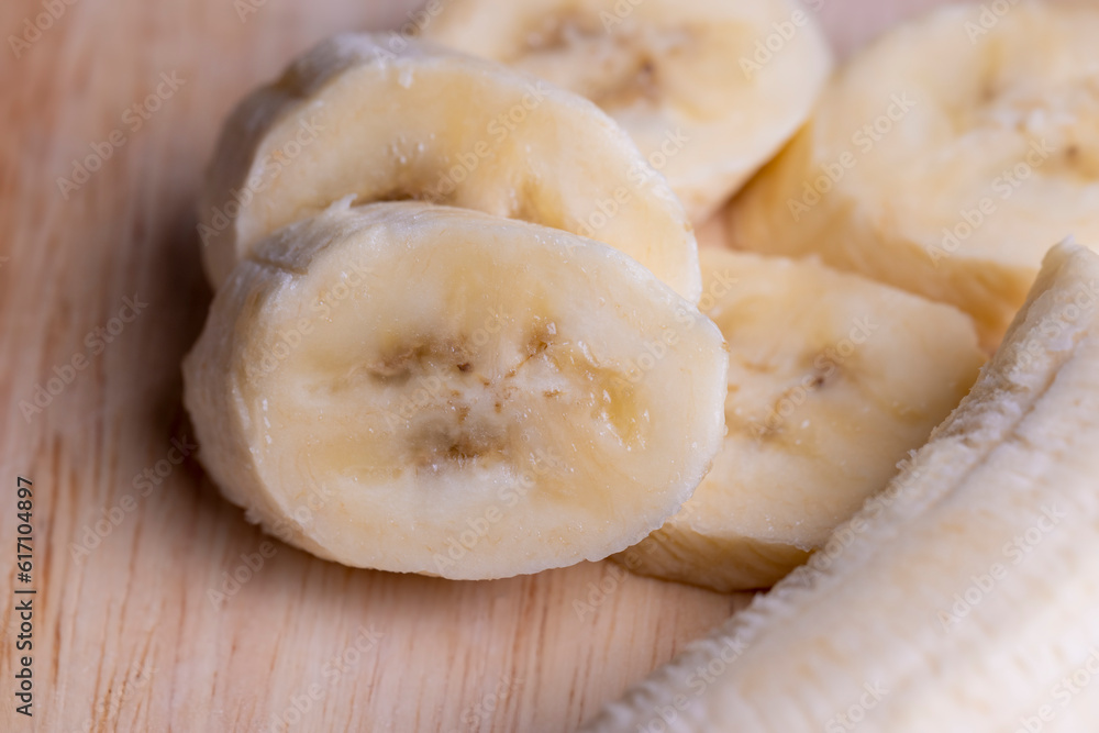 Sliced ripe banana on a cutting board