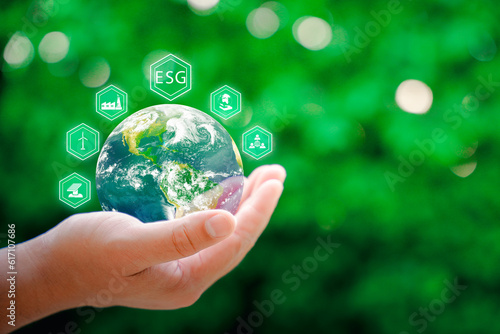 ESG. environment social governance investment business concept. Businessmen to analyze ESG, business investment strategy concept. Elements of this image furnished by NASA.