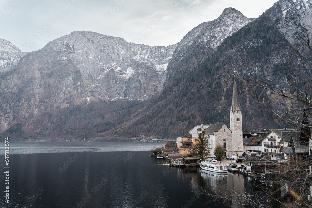 Beautiful view at the church on the lake located in Hallstatt, Austria.