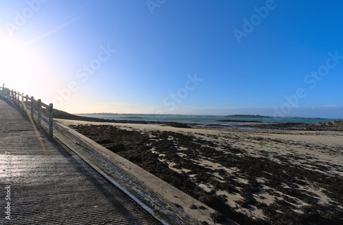 View of sand beach during low tide a winter sunny afternoon  Lancieux  Brittany  north of France