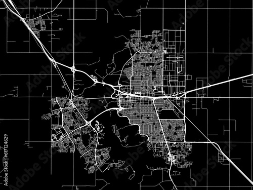 Vector road map of the city of  Lethbridge Alberta in Canada with white roads on a black background.