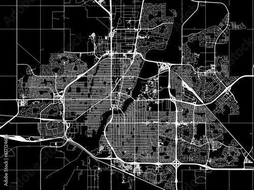 Vector road map of the city of  Saskatoon Saskatchewan in Canada with white roads on a black background.