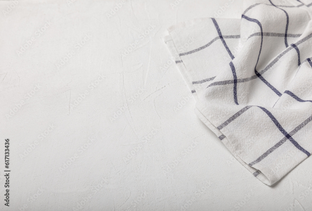 Obraz premium Kitchen towels on a marble background. New kitchen cotton towels on the kitchen table. Home textiles. Place for text. copy space.