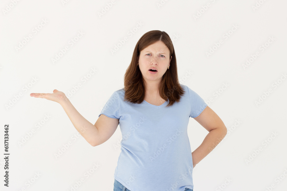 Pregnant confused puzzled caucasian woman isolated on white background Pregnant confused puzzled caucasian woman isolated on white background