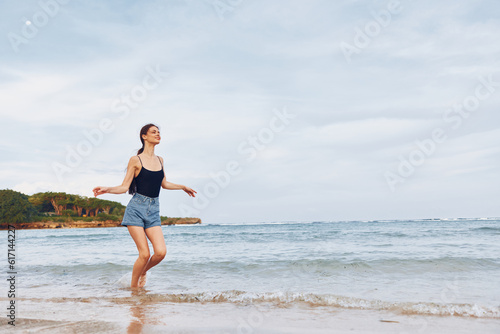 woman young sunset beach summer smile running sea lifestyle walking travel