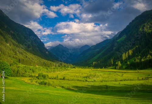 Scenic mountain landscape with beautiful valley and mountain peaks © Jansk