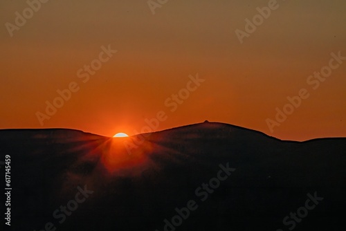 red sunset over the mountains © vardan
