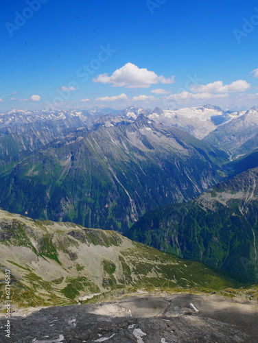 View on jagged mountains and glaciers of Zillertal alps on a summer day