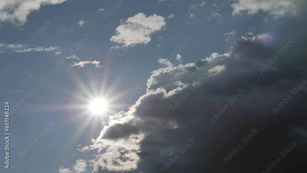 The sun hid behind the clouds. The sun is behind dark clouds during thunderstorms The sun hid behind the clouds. The sun is behind dark clouds during thunderstorms